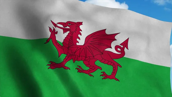 Флаг Уэльса, размахивающий на ветру, голубое небо. 3d-рендеринг — стоковое фото