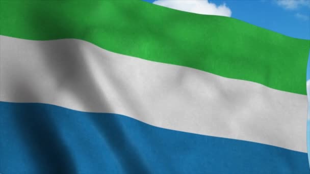 Bandiera Sierra Leone sventola nel vento, sfondo cielo blu. 4K — Video Stock