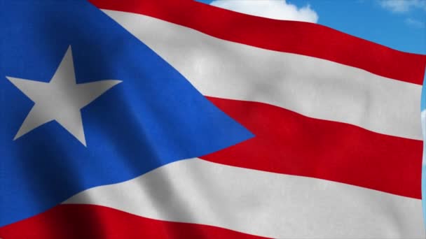 Puerto Rico flagga vinka i vinden, blå himmel bakgrund. 4K — Stockvideo