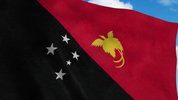 Papua-Neuguinea-Flagge weht im Wind, blauer Himmel Hintergrund. 4K — Stockvideo