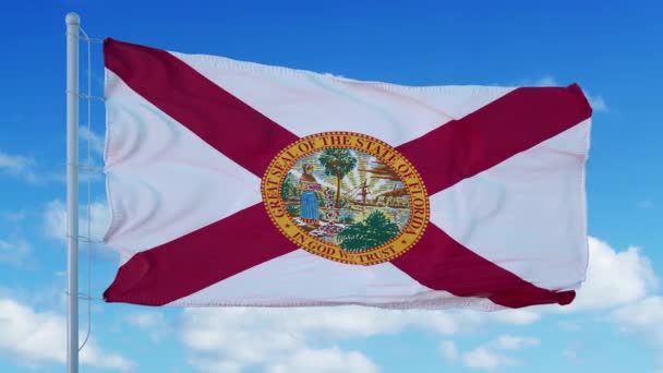 Florida flag waving in the wind, blue sky background. 4K — Stock Video