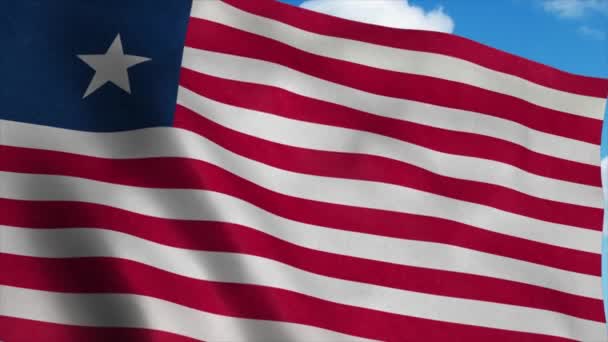 Liberia vlag wapperend in de wind, blauwe lucht achtergrond. 4K — Stockvideo