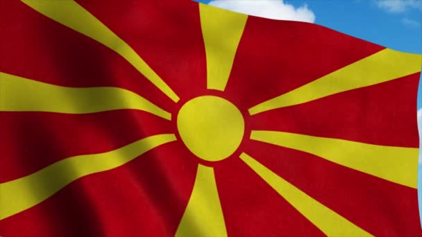 Makedonien flagga viftande i vinden, blå himmel bakgrund. 4K — Stockvideo
