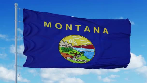 Bandera de Montana en un asta de la bandera ondeando en el viento, fondo azul del cielo. 4K — Vídeo de stock