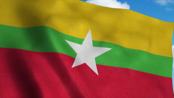 Myanmar flagga på en flaggstång viftande i vinden, blå himmel bakgrund. 4K — Stockvideo