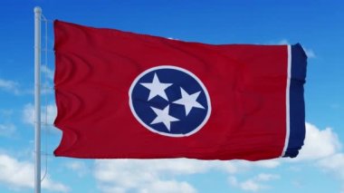 Tennessee bayrağı rüzgarda dalgalanan bayrak direğinde, mavi gökyüzü arka planında. 4K