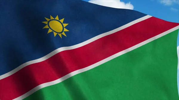 Flaga Namibii na maszcie flagowym machającym na wietrze, niebieskie tło nieba. 3d renderowanie — Zdjęcie stockowe