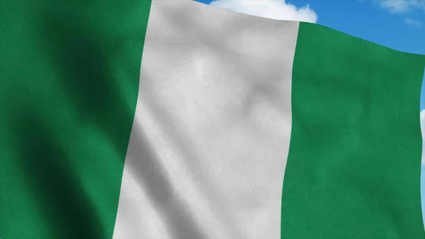 Flaga Nigerii na maszcie flagowym powiewającym na wietrze, niebieskie tło nieba. 3d renderowanie — Zdjęcie stockowe