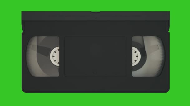 Cassete VHS. Velho sistema de gravação de vídeo. Cassete de vídeo isolado na tela verde — Vídeo de Stock