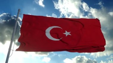 Türkiye bayrağı rüzgarda dalgalanıyor mavi bir arka planda