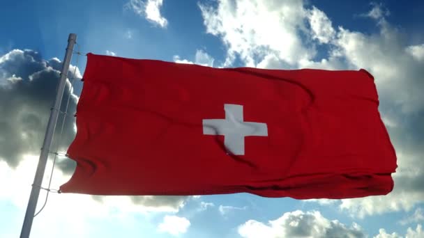 Nationell flagga Schweiz fladdrar i vinden mot en blå himmel — Stockvideo