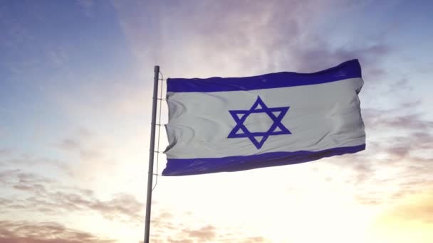 イスラエルの国旗が風になびく、劇的な空の背景。4K — ストック動画