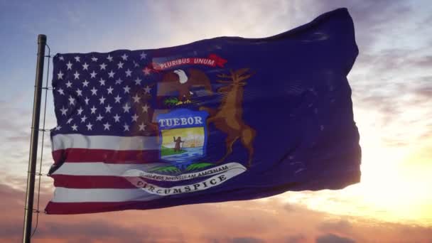 Bandera de Michigan y Estados Unidos en asta de bandera. Estados Unidos y Michigan Bandera mixta ondeando con viento — Vídeo de stock