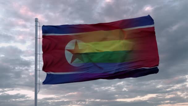 Viftande flagga Nordkorea stat och hbt regnbåge flagga bakgrund — Stockvideo