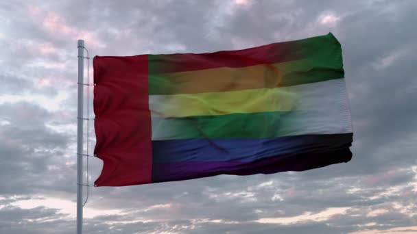 Drapeau agitant des Émirats arabes unis et fond du drapeau arc-en-ciel LGBT — Video