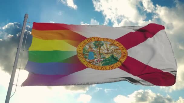 Bandera de Florida y LGBT. Florida y LGBT bandera mixta ondeando en el viento — Vídeos de Stock