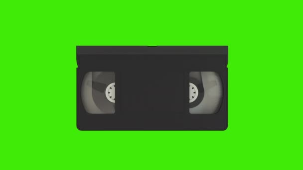 Cassete VHS. Cassete de vídeo isolado na tela verde — Vídeo de Stock