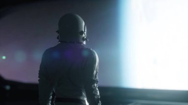 Bilinmeyen bir uzay gemisinin içindeki devasa aydınlığa bakan yalnız bir astronot. 3d oluşturma.
