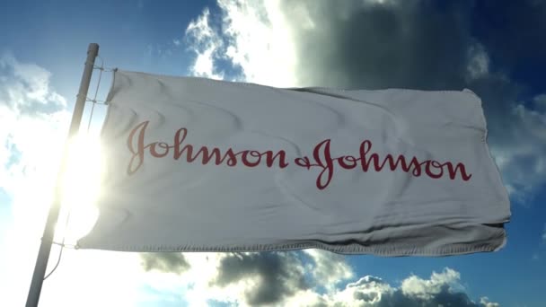 MOSCOW, RUSSIA, 2021. június: Johnson Johnson zászlója integet a szélben. Johnson Johnson bejelentette egy COVID-19 vakcina kifejlesztését — Stock videók