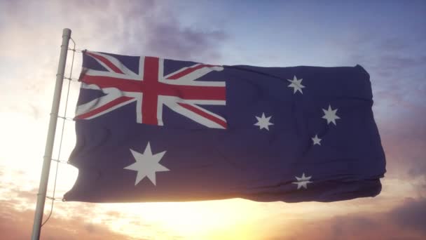 Australische Flagge weht im Wind gegen den strahlend schönen Himmel — Stockvideo
