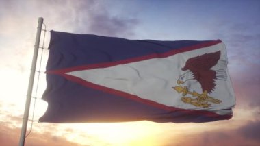 Rüzgarda, gökyüzünde ve arka planda dalgalanan Amerikan Samoa bayrağı