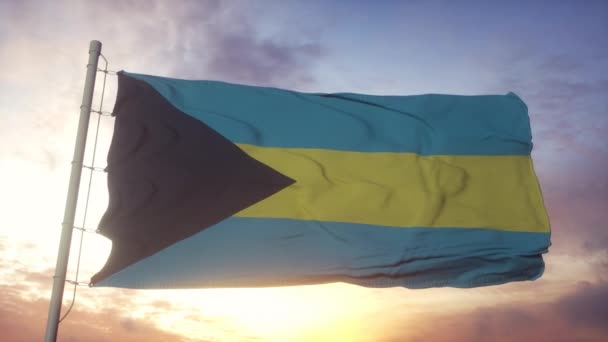 Bandera de Bahamas ondeando en el viento, cielo y sol de fondo — Vídeo de stock