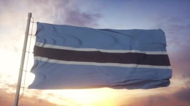 Botswana bayrağı rüzgarda, gökyüzünde ve arka planda dalgalanıyor
