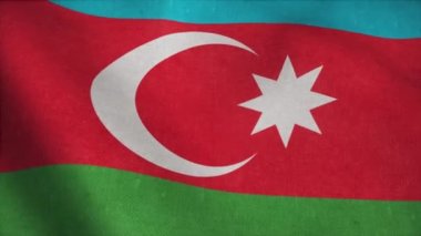 Yavaş çekimde Azerbaycan bayrağı rüzgarda sallanıyor.