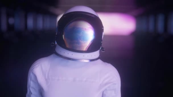 Portrait shot of the alone astronaut wearing helmet in space. Space travel, exploration and solar system colonization concept — Stock Video