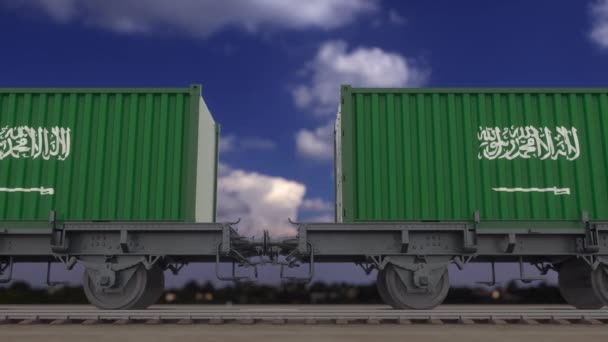 Поезд и контейнеры с флагом Саудовской Аравии. Железнодорожный транспорт. Бесшовная петля 4K — стоковое видео