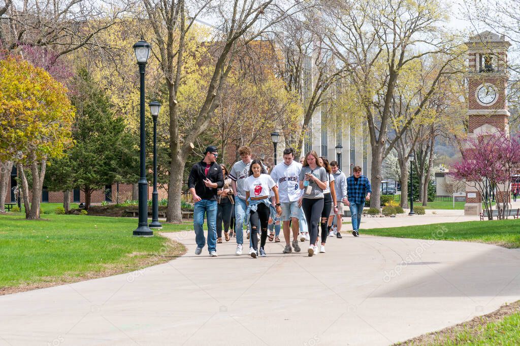 LA CROSSE, WI,USA - APRIL 17, 2021 - Unidentified individuals on the campus of the University of Wisconsin-La Crosse.
