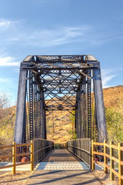 Railroad Bridge Over Iron Horse Trailhead clipart