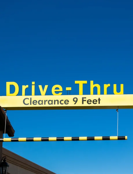 Yellow Overhead McDonald 's Drive-Thru Sign — стоковое фото