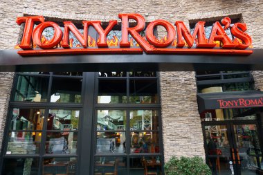 Tony Roma's Restaurant Exterior and Logo. clipart