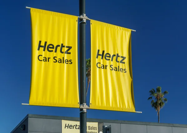 Sinal de vendas de carro Hertz e logotipo — Fotografia de Stock