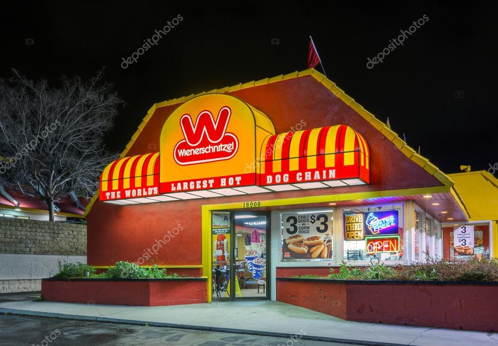 SANTA CLARITA, CA/USA - JANUARY, 5, 2016: Wienerschnitzel fast foot restaurant and sign.  Wienerschnitzel is an American fast food chain that specializes in hot dogs.