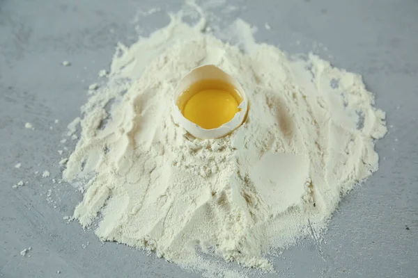 ingredients for homemade pasta. Food background: macaroni, spagetti, egg, flour