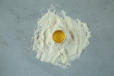 ingredients for homemade pasta. Food background: macaroni, spagetti, egg, flour