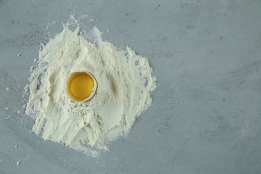 ingredients for homemade pasta. Food background: macaroni, spagetti, egg, flour