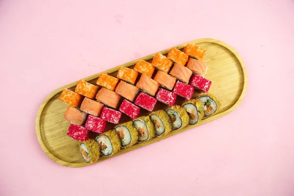 Various kinds of sushi served, close-up view — Stock Photo, Image