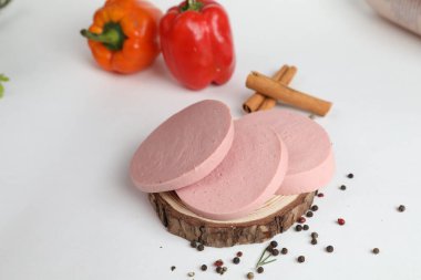 Smoked pork sausages, isolated on white background.