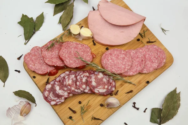 Smoked pork sausages, isolated on white background.