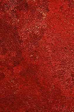 Koyu kırmızı ve sarı renklerde soyut kumsal arkaplanı. Buz ateşi. Buz kristallerinin yüzeyi yakın plan. Renkli, dikey arka plan ya da duvar kağıdı. Kaotik noktalar ve çizgiler. Makro