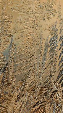 Açık kahverengi cep telefonu duvar kağıdı. Sihirli fantastik bitkilerin bir düzeni. Ters dikey arkaplan ya da sarı ya da kum rengi arkaplan. Kışın pencere camında buz kristalleri.