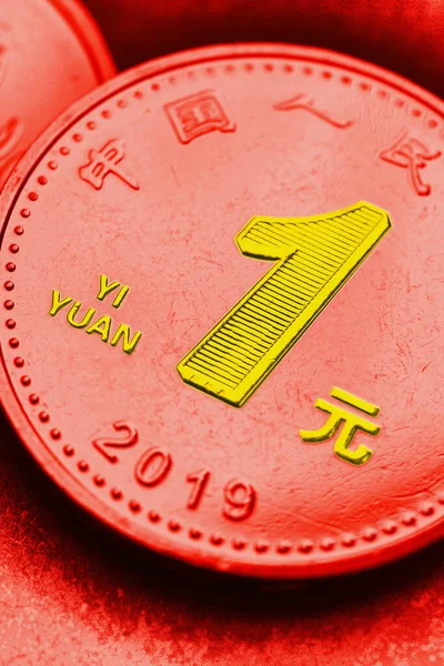 Translation: People\'s Bank of China, one yuan. Chinese coin close-up. Bright vertical tinted illustration in the colors of the PRC flag. Number, name and currency symbol are highlighted in yellow