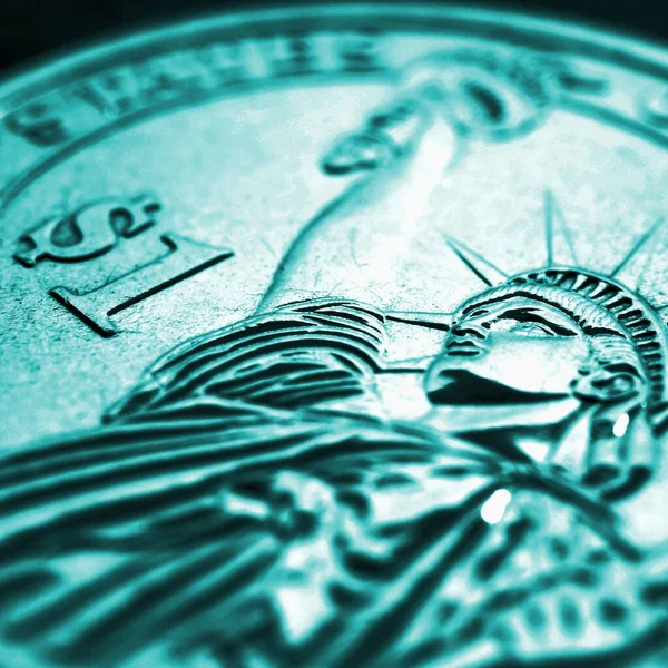 一美元硬币的特写 Aquamarine对美国的货币 债务市场作了平方的说明 — 图库照片
