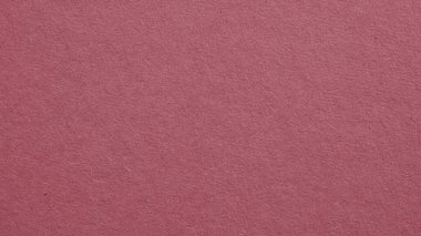 Koyu kırmızı karton yüzey. Pembe kağıt duvar kağıdı. Selüloz lifli kağıt dokusu. Mor kahverengi arka plan. Güzel desenli arka plan. Baştan aşağı. Makro