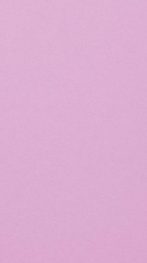 Açık mor renkli kağıt yüzeyi. Sakin bir yaz cep telefonu duvar kağıdı. Rahatlatıcı dikey arkaplan veya arkaplan