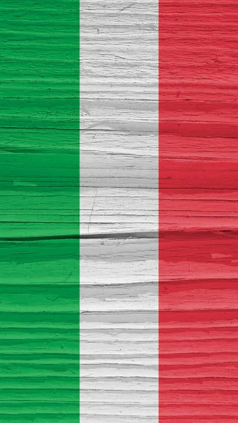 乾燥した木製の表面にイタリアの旗は 年齢で割れています 風になびいているようだ 垂直携帯電話の壁紙やイタリアの国民のシンボルと背景 古木の年輪 — ストック写真