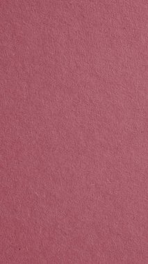 Koyu kırmızı karton yüzey. Pembe kağıt kaplı cep telefonu duvar kağıdı. Selüloz lifli kağıt dokusu. Mor-kahverengi dikey arka plan. Güzel desenli arka plan. Baştan aşağı. Makro
